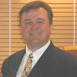 a man in a suit and tie