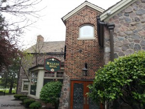 a brick building with a sign