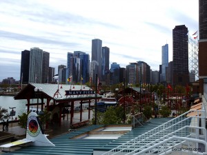 a city skyline with a large building in the background
