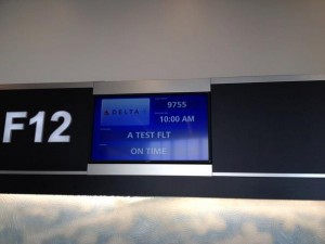 a digital sign with numbers and a blue screen