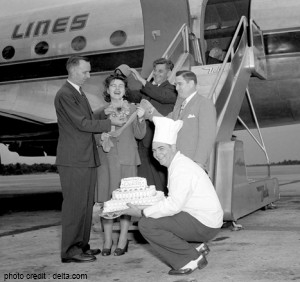 a group of people getting into an airplane