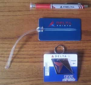 a pen and key chain on a table