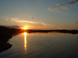 a sunset over a lake