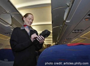 a woman holding a bag in her hand