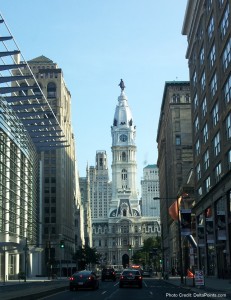 a city hall with a tall tower