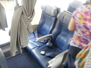 a seat belt on a plane