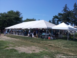 a white tent with people in it