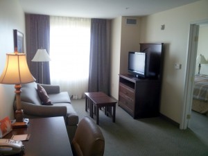 a living room with a tv and a table