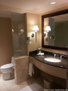 a bathroom with a mirror and sink