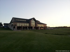 a large building with a large lawn