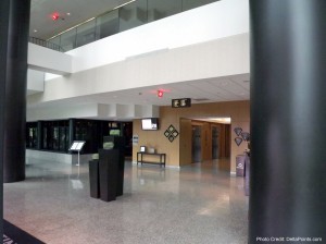 a large building with a large black pole