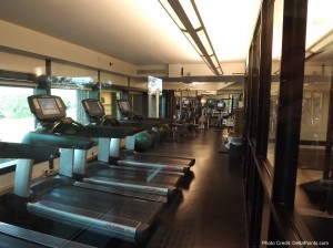 a room with treadmills and exercise equipment