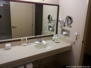a bathroom with a mirror and sink