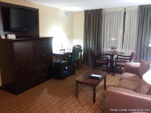 a room with a television and a table