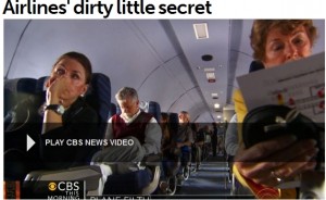 a group of people sitting in an airplane