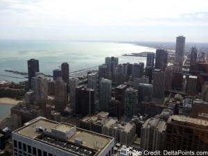 a city skyline with water in the background