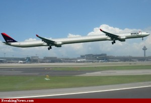 long shot of a plane flying over a runway