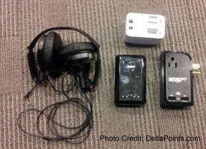 a close-up of a phone and headphones