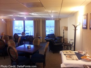 a room with a table and chairs