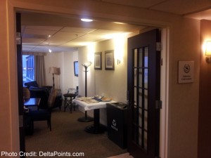 a room with a table and chairs