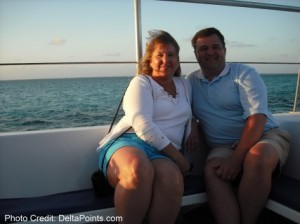 a man and woman sitting on a boat