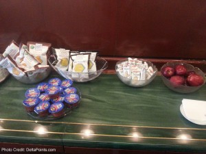 a table with bowls of food and a bowl of yogurt