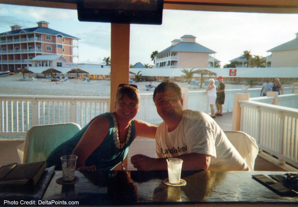 a man and woman sitting at a table