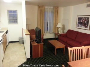 a living room with a couch and a tv