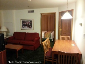 a room with a table and chairs