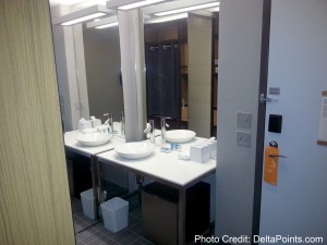 a bathroom with sinks and mirrors