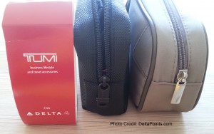 a small black bag next to a red box