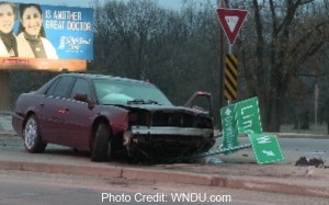 a car crashed into a sign