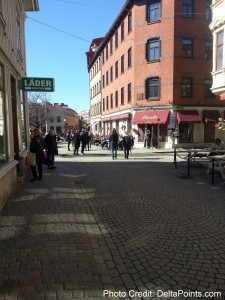 a group of people walking on a street