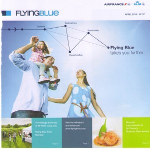 a family with a child on their shoulders