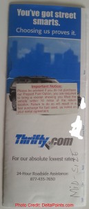 a white package with a red and blue text