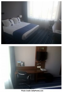 a room with a bed and a desk