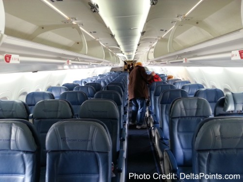 a person walking on an airplane