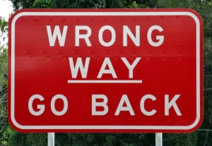 road sign wrong way go back