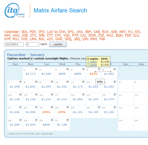 lax to stt 1st class