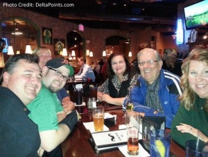 a group of people sitting at a table