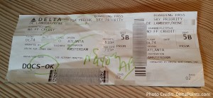 tsa marking up a delta paper boarding pass