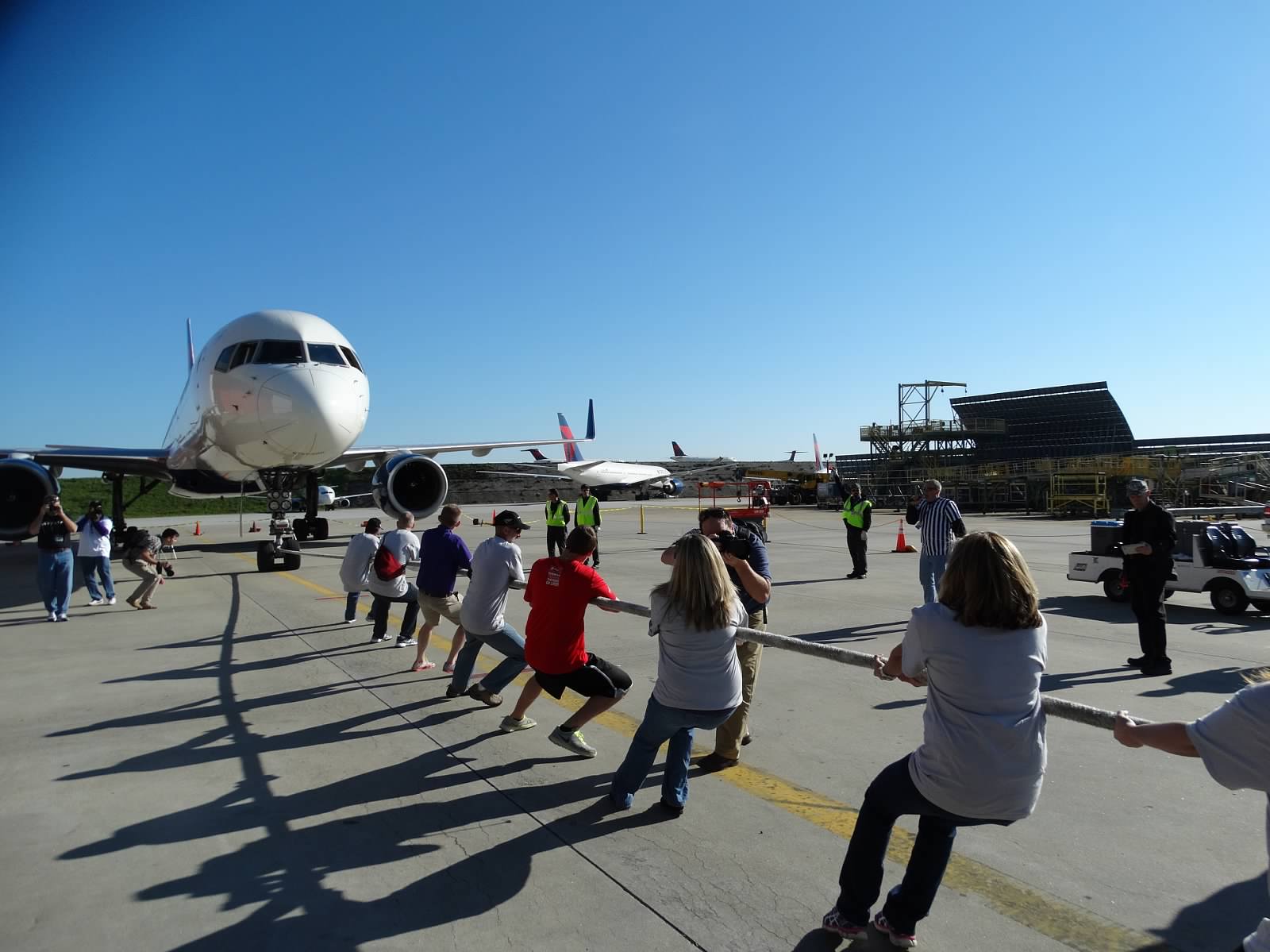 I went totally “Plane Crazy” at the Delta Charity Jet Pull – by Noah Mark