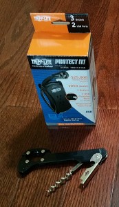 new trip-lite surge and TSA OK bottle opener