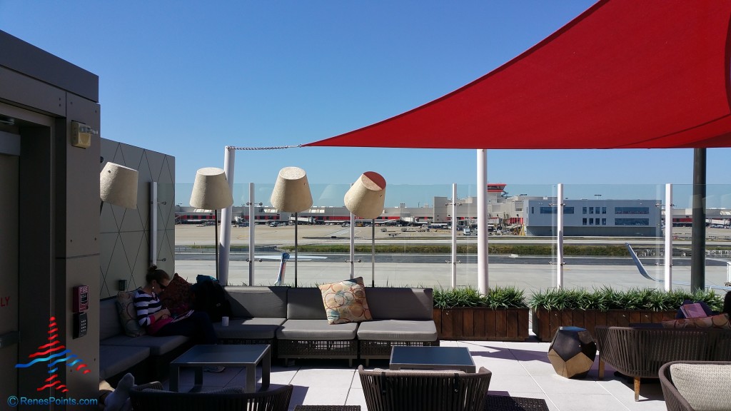 a red awning over a patio area