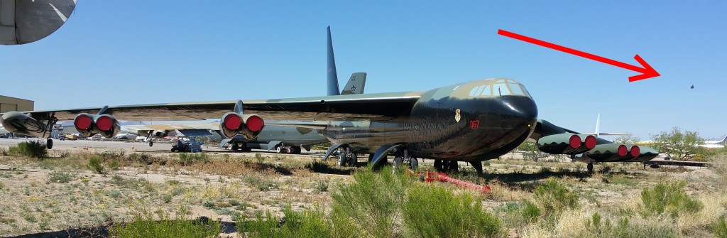 a military plane parked on a runway