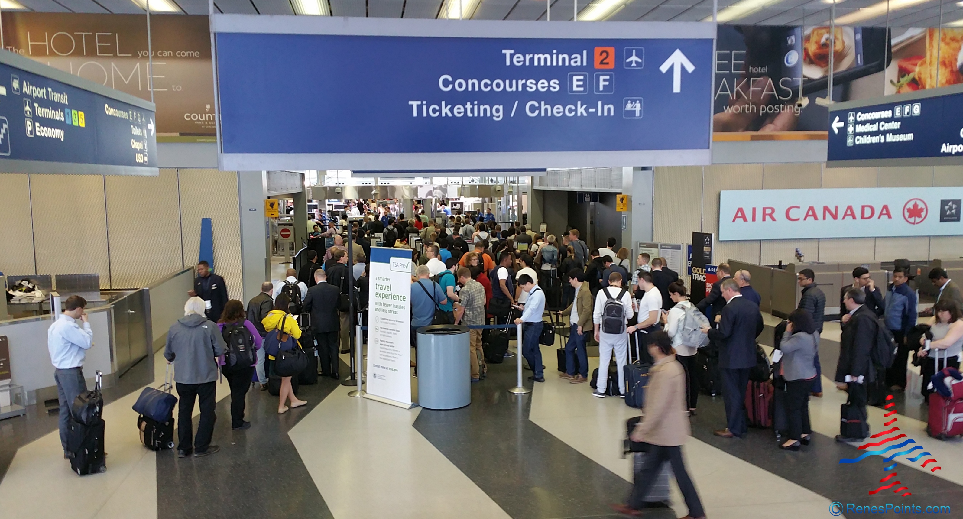 a group of people in an airport