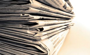 huge-stack-of-news-papers