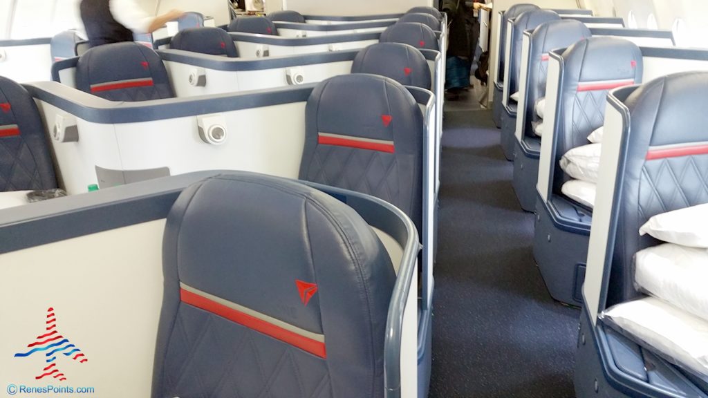 A Delta One business class seat on a Delta Air Lines A330 aircraft.