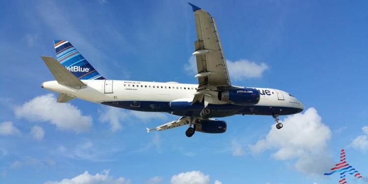 a plane flying in the sky