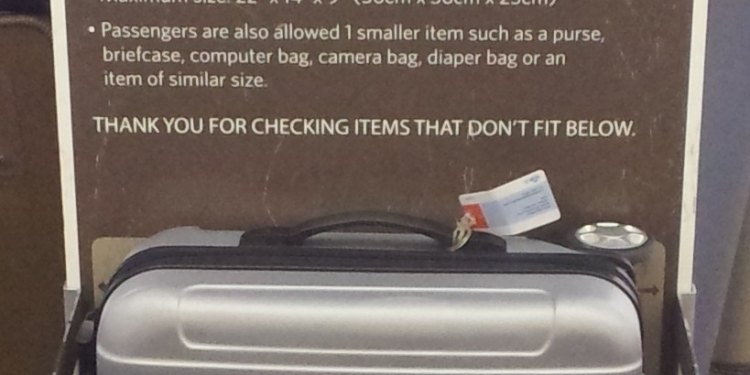 a suitcase in a sign